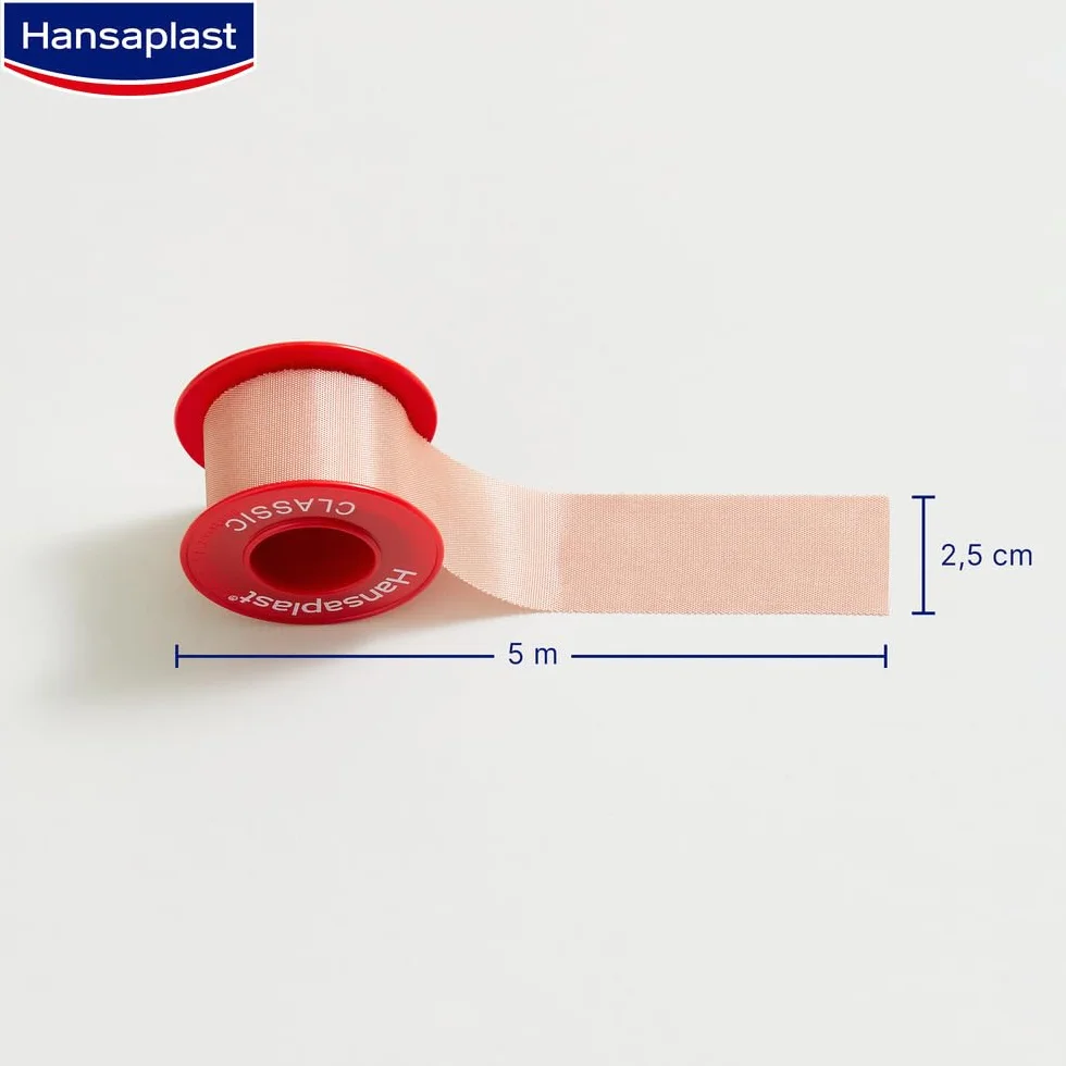 Hansaplast Plaster mocujący Classic (5 m x 2,5 cm), taśma do łatwego i bezpiecznego mocowania opatrunków, rolka z dużą siłą klejenia.